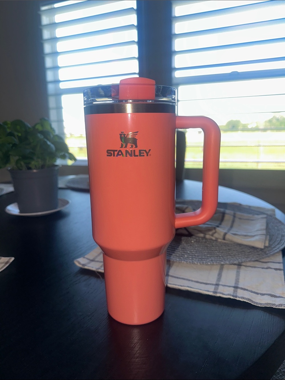 Stanley Coral-Orange Travel Mug with Handle